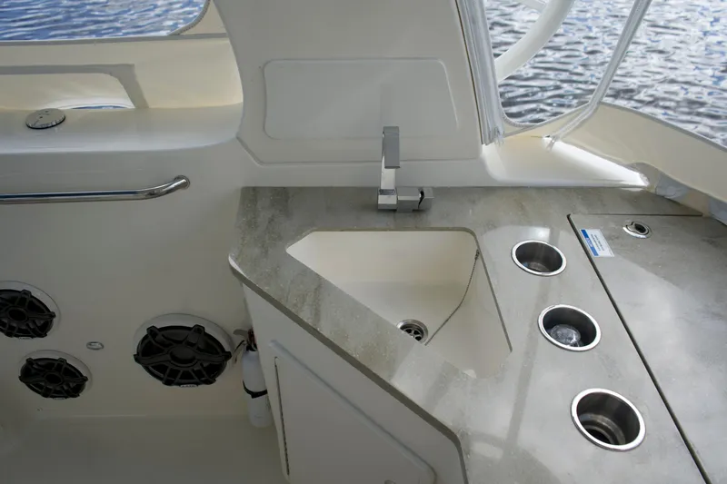 Yacht Kings Yacht Photos Pics 2020 Boston Whaler 350 Realm boat interior with sink and countertop.