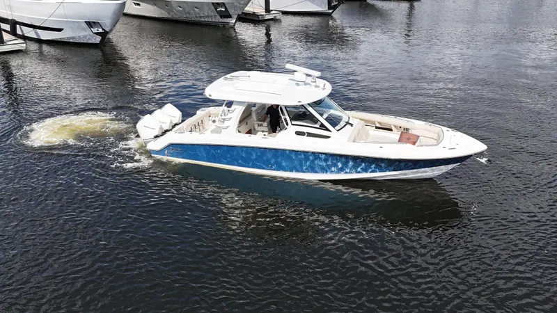 Yacht Kings Yacht Photos Pics 2020 Boston Whaler 350 Realm boat cruising on calm water.