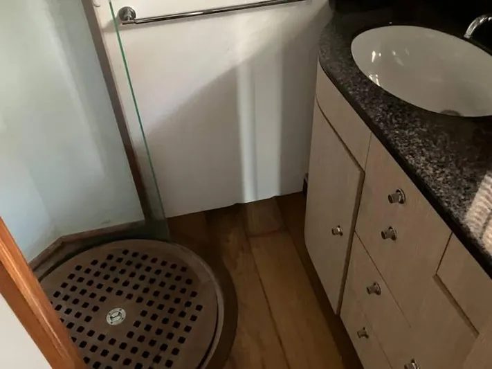 Vintage Yacht Photos Pics Bathroom interior of 2006 Guy Couach 2100 yacht with shower and sink.