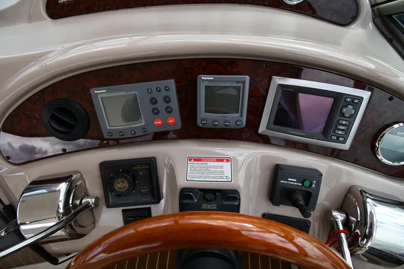  Yacht Photos Pics Control panel of a 2003 Sea Ray 460 Sundancer yacht with navigation instruments.