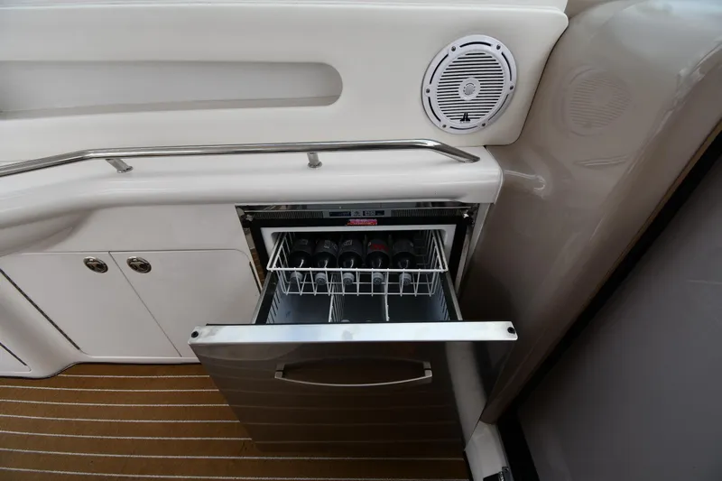  Yacht Photos Pics Open drawer with wine bottles on a 2003 Sea Ray 460 Sundancer yacht.