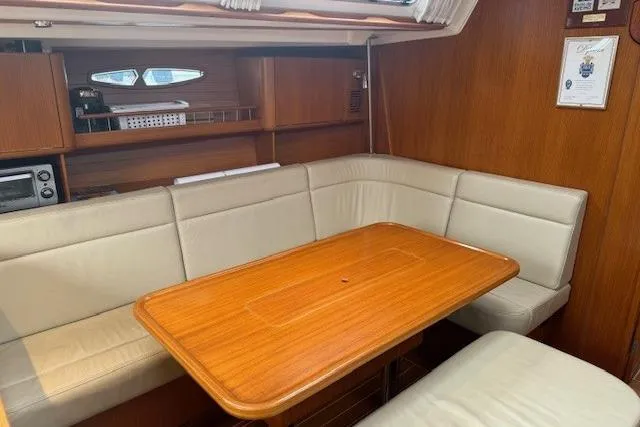  Yacht Photos Pics Interior of 2006 X-Yachts X-50 leather settee and dining table