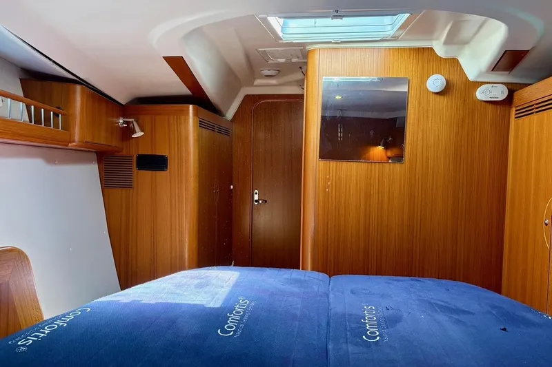  Yacht Photos Pics Interior of 2006 X-Yachts X-50, featuring wooden paneling and a skylight.