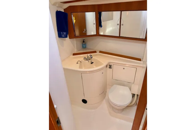  Yacht Photos Pics Bathroom of 2006 X-Yachts X-50 sailboat with sink, toilet, and mirror cabinet.