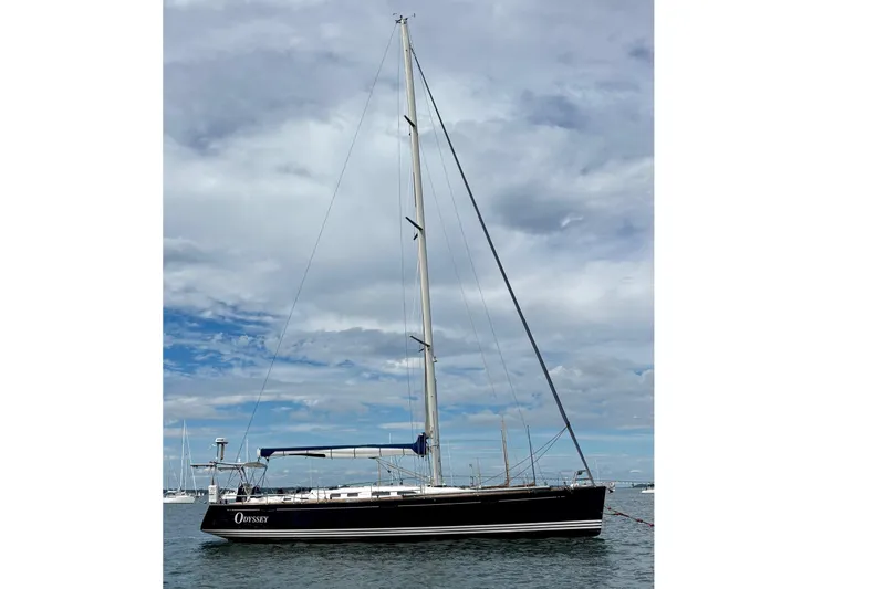  Yacht Photos Pics 2006 X-Yachts X-50 sailboat on calm water under cloudy sky.