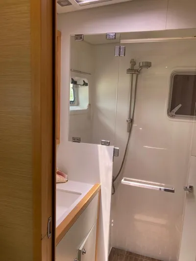 The Recipe Yacht Photos Pics Bathroom interior of 2011 Lagoon 560 yacht with shower and sink.