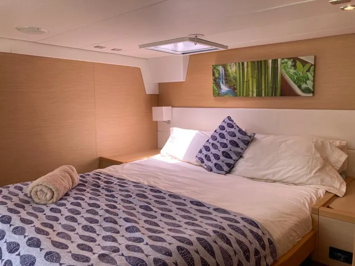 The Recipe Yacht Photos Pics Luxurious cabin interior of 2011 Lagoon 560 yacht with cozy bedding and decor.