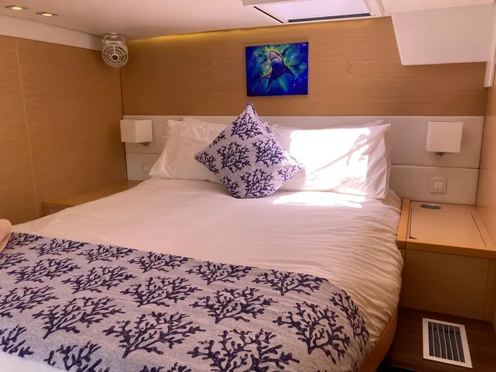 The Recipe Yacht Photos Pics Luxurious cabin interior of 2011 Lagoon 560 yacht with elegant bedding and decor.