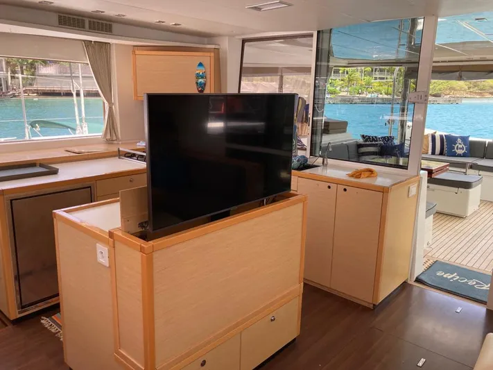 The Recipe Yacht Photos Pics Interior of 2011 Lagoon 560 yacht with modern furnishings and ocean view.