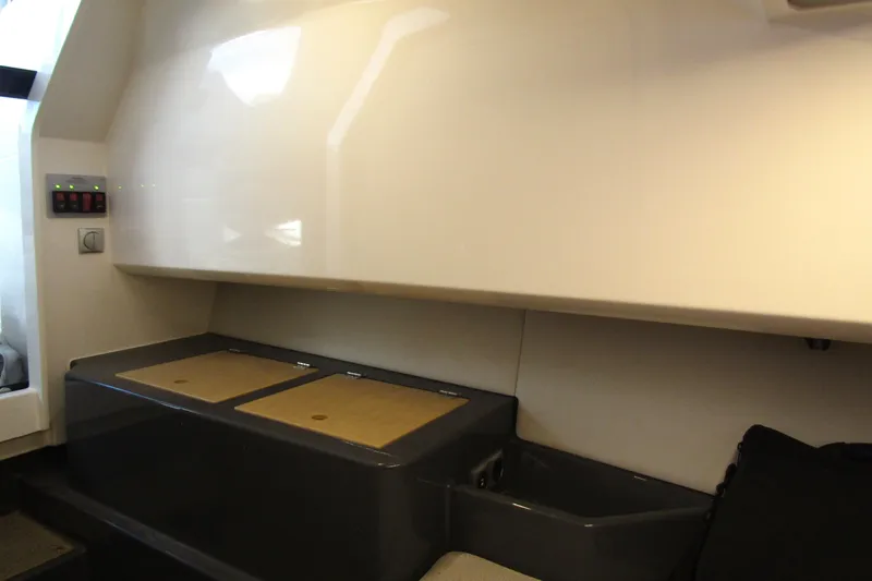  Yacht Photos Pics 2023 Windy SR28 CC interior cabin with sleek storage compartments.