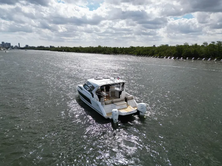 Yaffa Yacht Photos Pics Aquila 36 boat cruising on a sunny river, 2021 model.