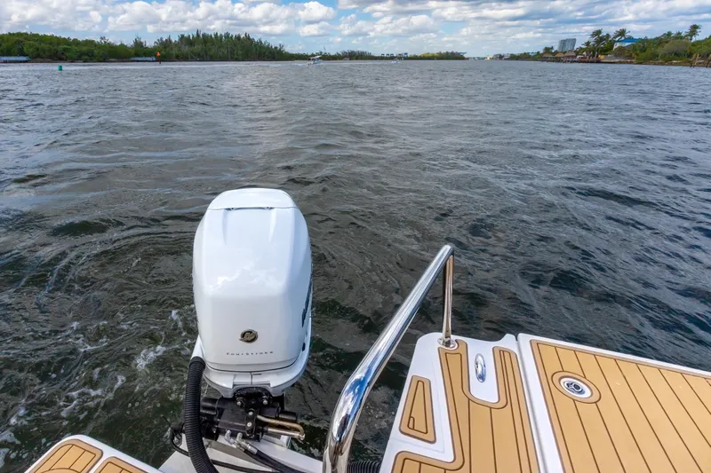 Yaffa Yacht Photos Pics Aquila 36 boat with outboard motor on a scenic waterway, 2021 model.