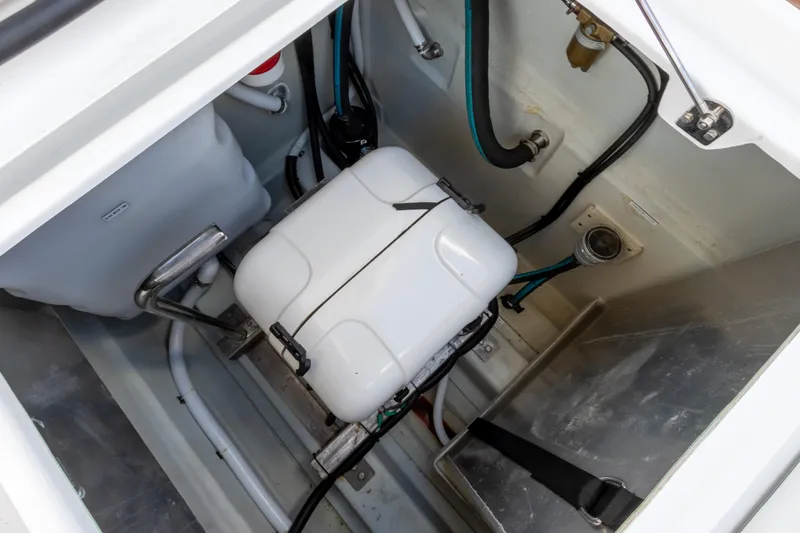 Yaffa Yacht Photos Pics Aquila 36 (2021) boat storage compartment with equipment and wiring.