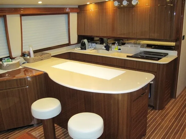 No Name Yacht Photos Pics Luxurious kitchen interior of 2008 Viking Convertible 60 yacht with modern amenities.