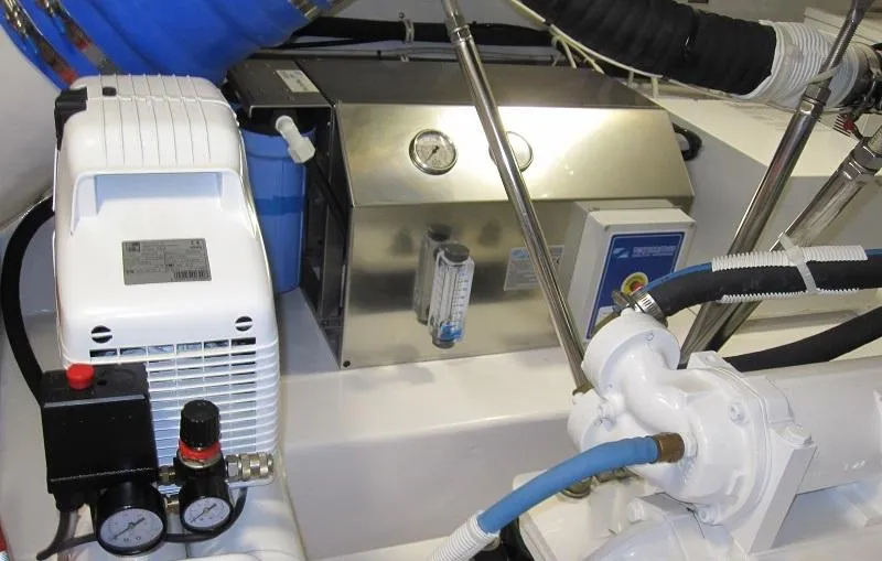 No Name Yacht Photos Pics Engine room of 2008 Viking Convertible 60 yacht with mechanical equipment and gauges.