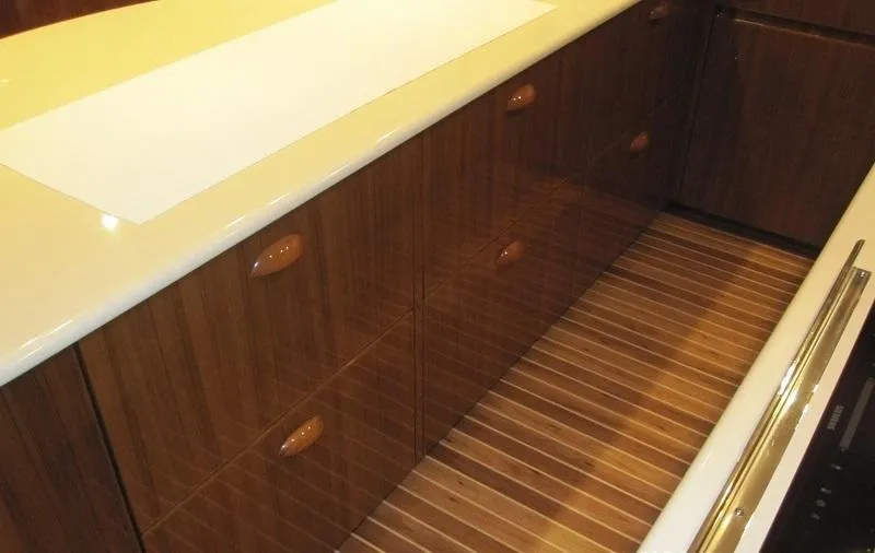 No Name Yacht Photos Pics 2008 Viking Convertible 60 yacht interior with wooden cabinets and sleek countertop.