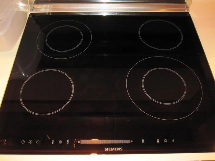 No Name Yacht Photos Pics Modern Siemens electric cooktop with four burners and touch controls.