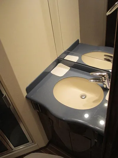 No Name Yacht Photos Pics Bathroom sink area in a 2008 Viking Convertible 60 yacht.