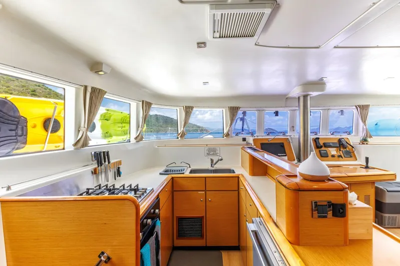 Azuria Yacht Photos Pics Interior of 2011 Lagoon 500 yacht with modern kitchen and panoramic windows.