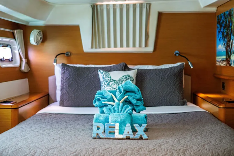 Azuria Yacht Photos Pics Luxurious Lagoon 500 yacht bedroom with "Relax" decor and elegant bedding, 2011 model.