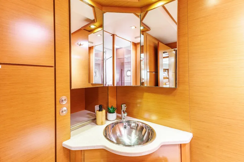 Azuria Yacht Photos Pics Luxurious Lagoon 500 yacht bathroom with wooden finish and modern fixtures, 2011 model.