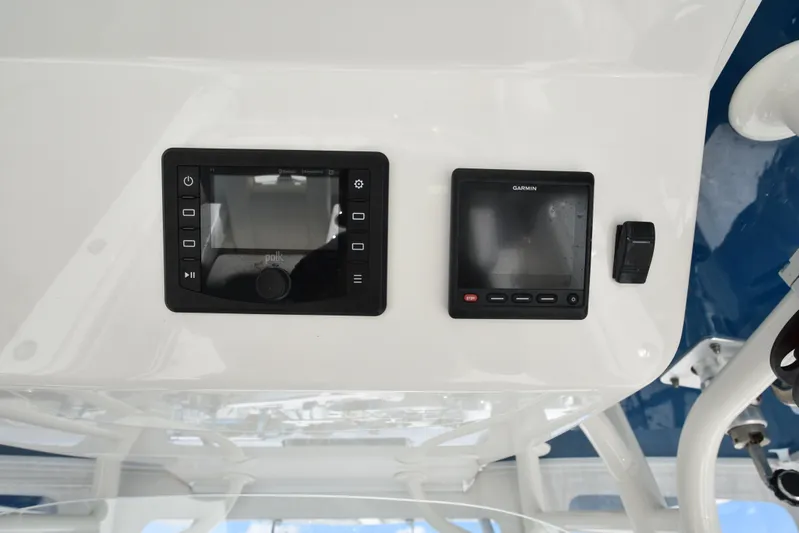 Why Knot II Yacht Photos Pics Regulator 34SS 2018 console with Garmin and Polk devices.