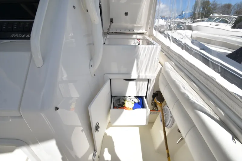 Why Knot II Yacht Photos Pics Interior of Regulator 34SS boat, showing drawers and storage space.