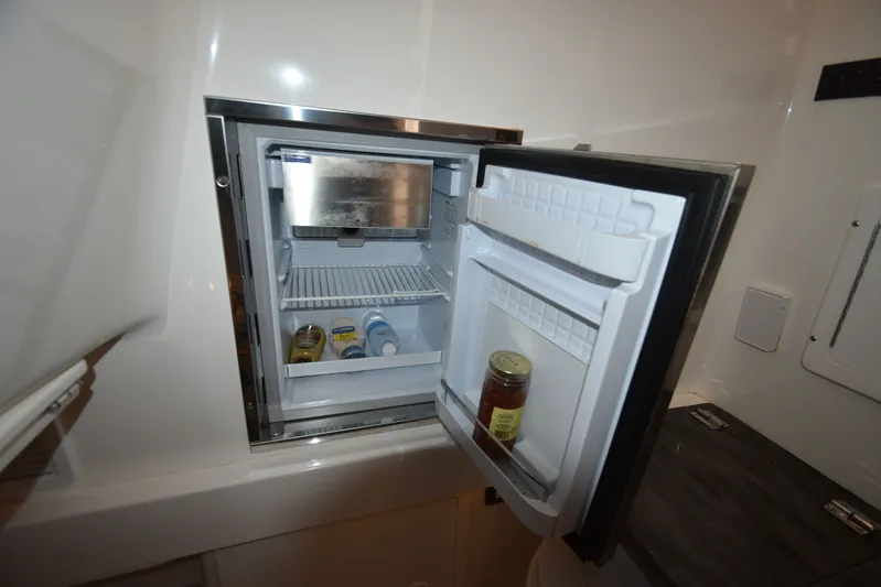 Why Knot II Yacht Photos Pics Open refrigerator on a 2018 Regulator 34SS boat.