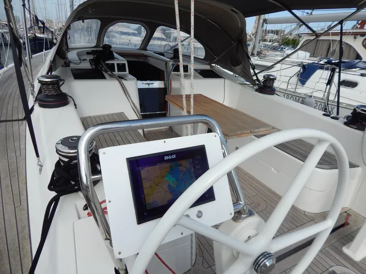  Yacht Photos Pics Italia Yachts 13.98 (2021) cockpit with navigation system and steering wheel.