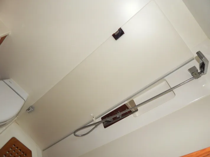  Yacht Photos Pics Bathroom interior of 2021 Italia Yachts 13.98, featuring modern shower and toilet.