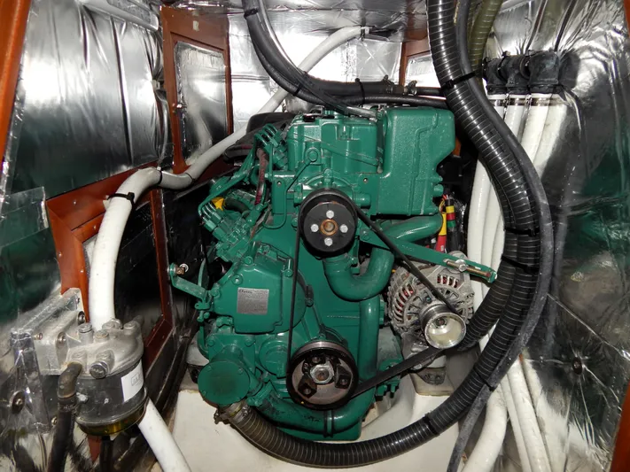  Yacht Photos Pics Engine room of 2021 Italia Yachts 13.98, featuring a green marine engine.