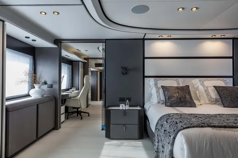  Yacht Photos Pics Luxurious bedroom interior on 2025 Extra X130 TRIPLEX yacht, featuring modern design and elegant furnishings.