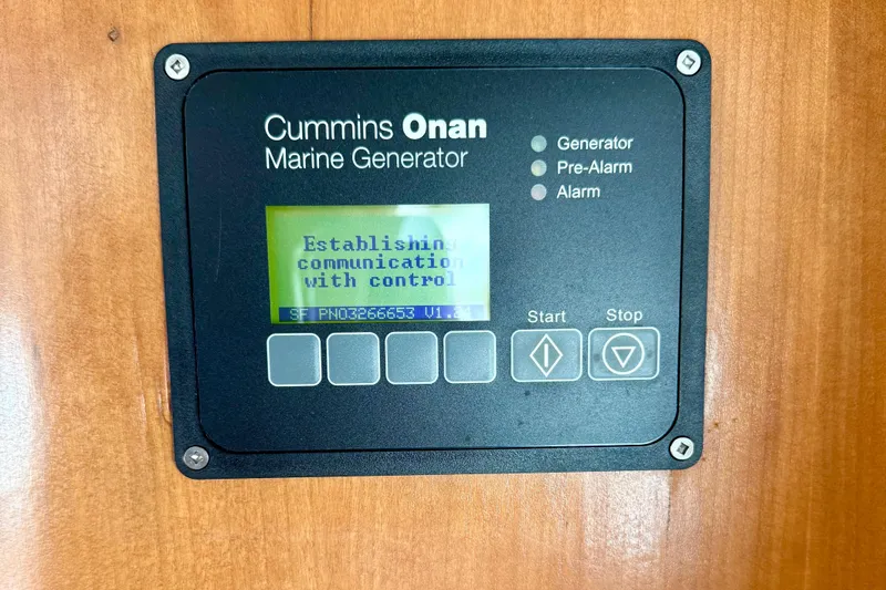 Trademarc Yacht Photos Pics Cummins Onan marine generator control panel on 2004 Meridian 490 Pilothouse yacht.