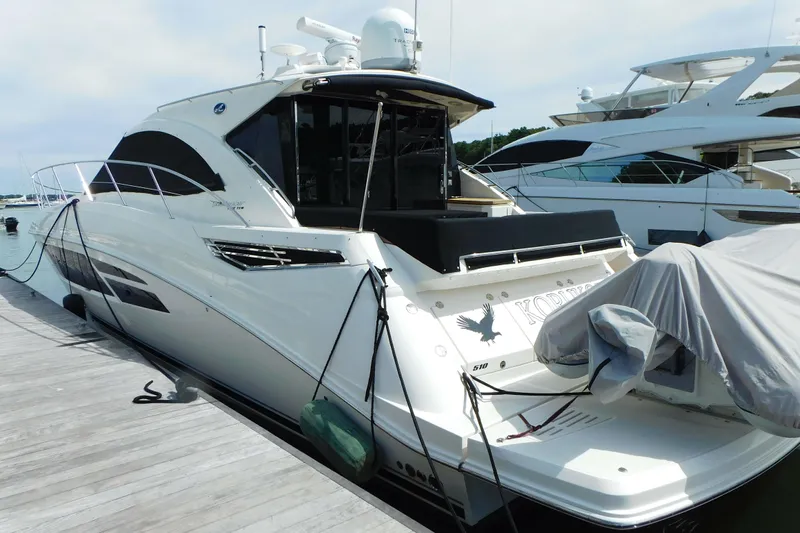  Yacht Photos Pics 2013 Sea Ray 510 Sundancer yacht docked at marina, rear view.