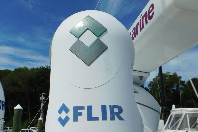  Yacht Photos Pics FLIR camera on 2013 Sea Ray 510 Sundancer yacht, docked with clear sky background.