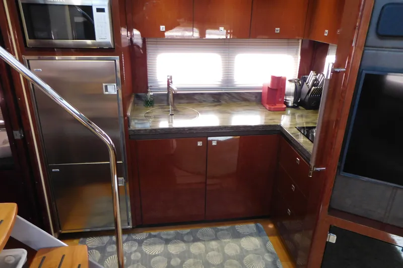  Yacht Photos Pics Luxurious kitchen interior of 2013 Sea Ray 510 Sundancer yacht with modern appliances.