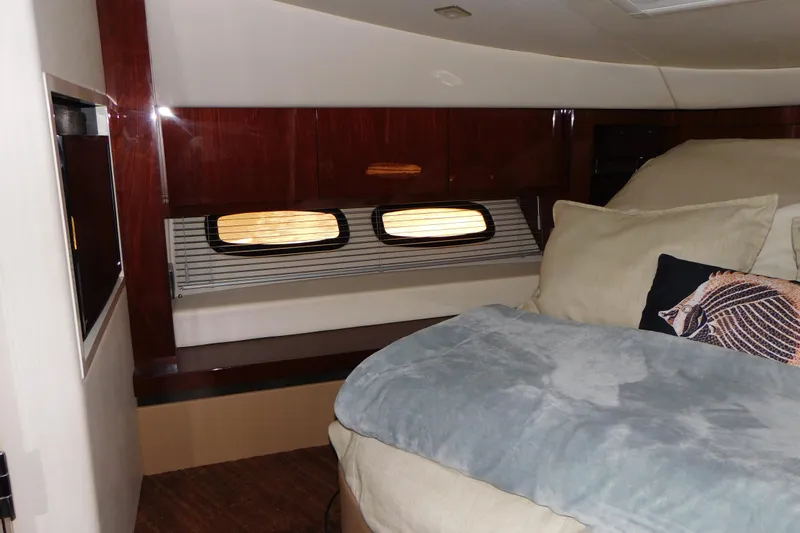  Yacht Photos Pics Luxurious cabin interior of 2013 Sea Ray 510 Sundancer yacht with cozy bedding.