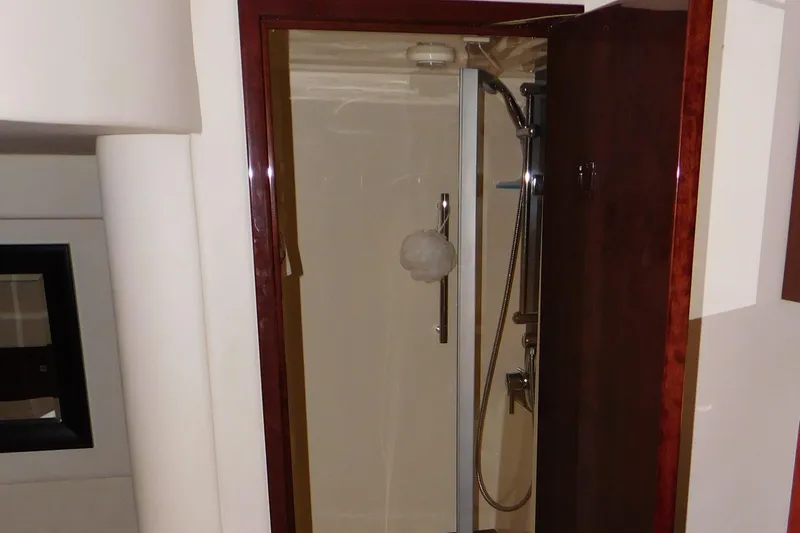  Yacht Photos Pics Shower area in 2013 Sea Ray 510 Sundancer yacht, featuring sleek design and modern fixtures.