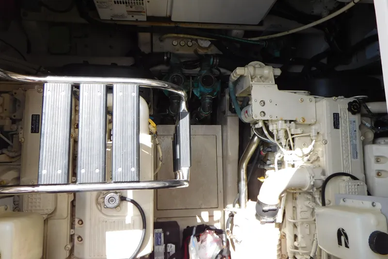  Yacht Photos Pics Engine room of 2013 Sea Ray 510 Sundancer with visible machinery and ladder.