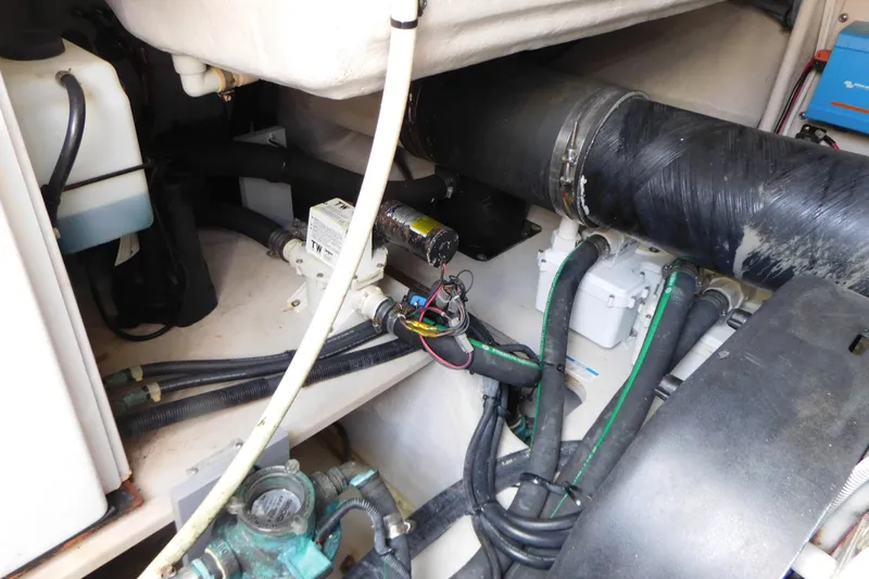  Yacht Photos Pics Engine compartment of 2013 Sea Ray 510 Sundancer with hoses and mechanical components.