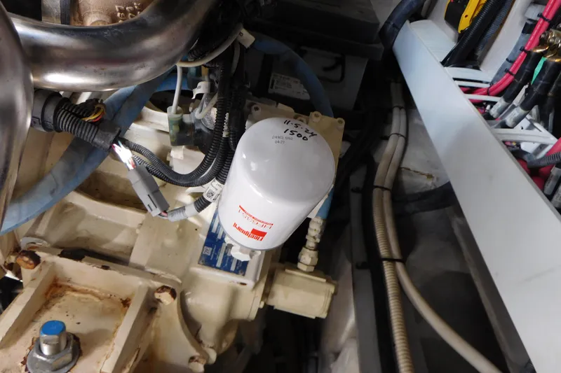  Yacht Photos Pics Engine compartment of a 2013 Sea Ray 510 Sundancer, featuring wiring and a filter.