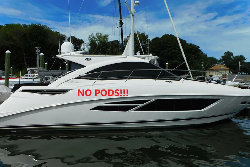  Yacht Photos Pics 2013 Sea Ray 510 Sundancer yacht docked, featuring "NO PODS!!!" text on the side.