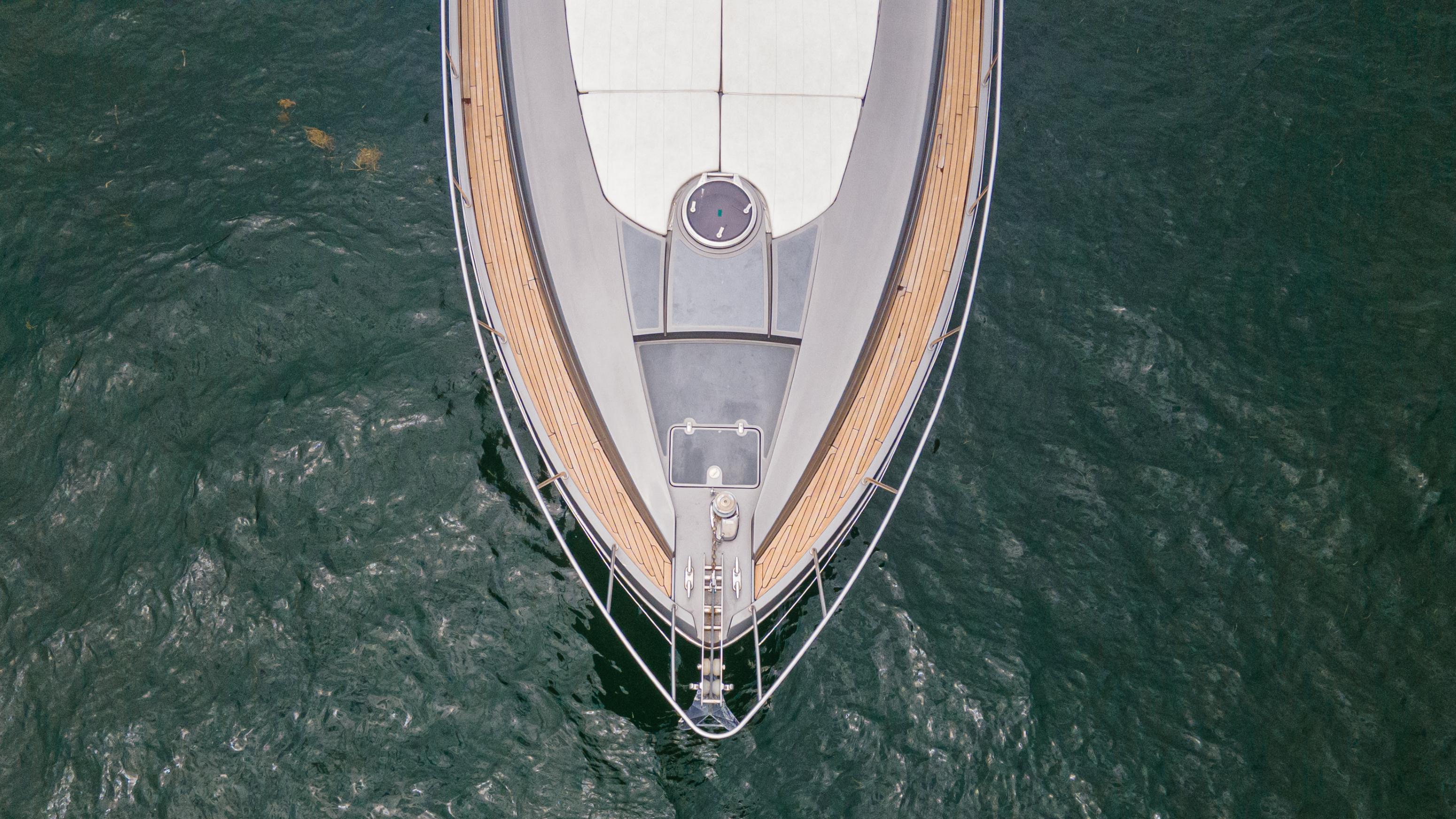 Aerial view of 2009 Pershing 64 yacht on water.