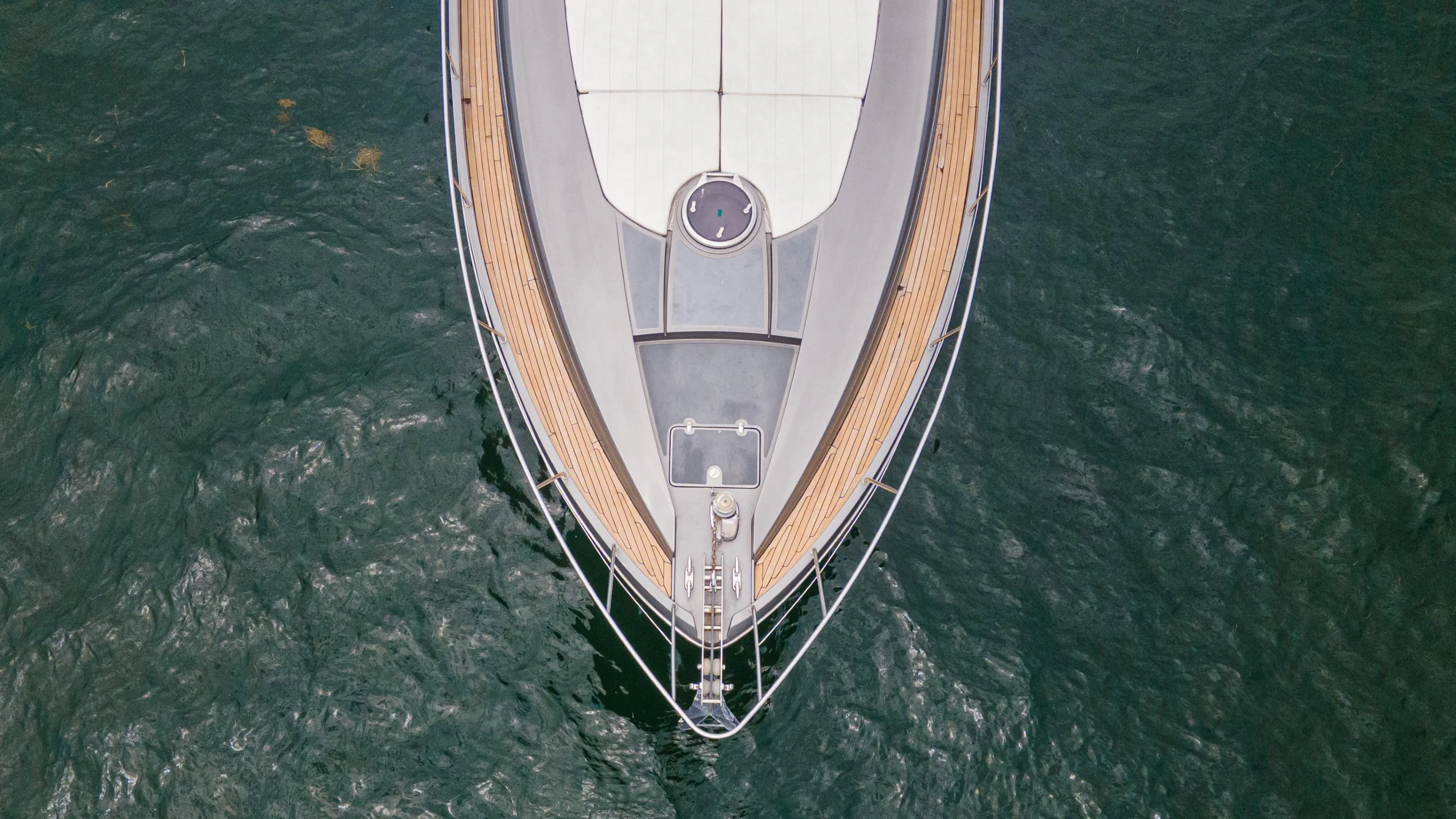 Aerial view of 2009 Pershing 64 yacht on water.