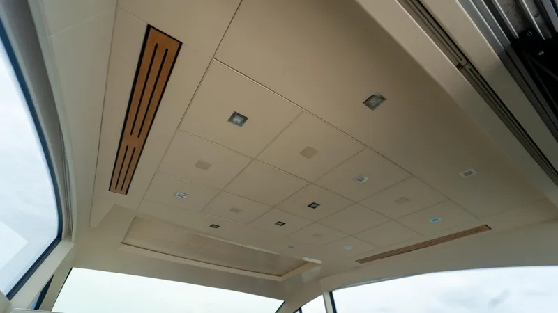 Wind Yacht Photos Pics Ceiling interior of 2009 Pershing 64 yacht with modern lighting and design.