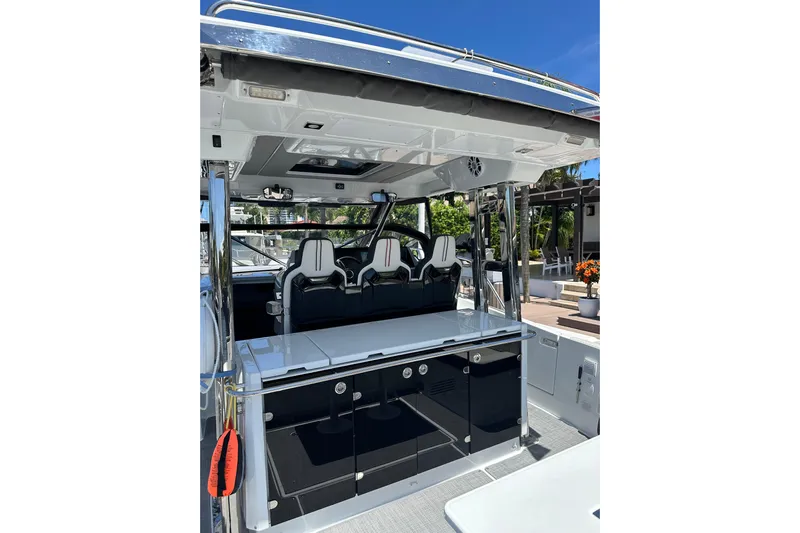  Yacht Photos Pics 2022 Jeanneau Leader 12.5 WA boat interior with sleek seating and modern design.