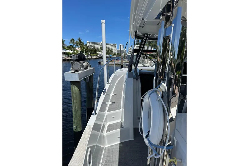  Yacht Photos Pics 2022 Jeanneau Leader 12.5 WA docked, showcasing sleek design and modern features.