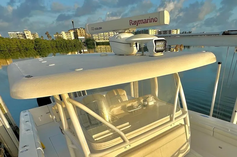  Yacht Photos Pics 2017 Stamas 390 Tarpon boat with Raymarine radar, docked by calm waters.