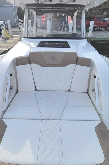  Yacht Photos Pics 2018 Edgewater 370CC boat with luxurious white seating and diamond stitching.