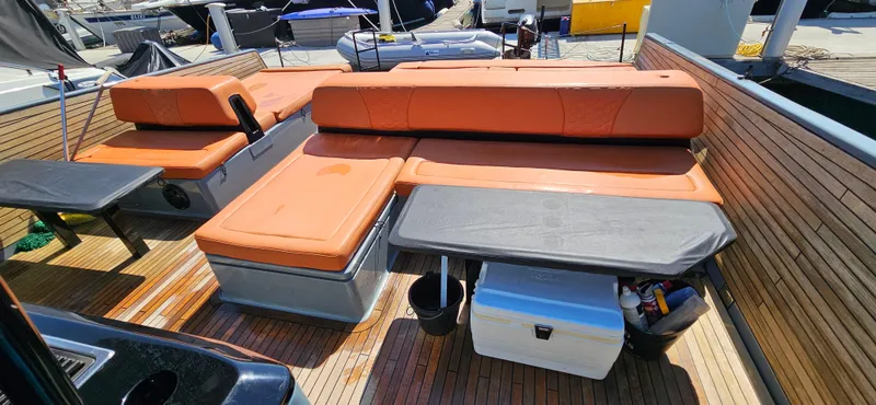  Yacht Photos Pics Luxurious Sunreef 40 Power yacht deck with orange seating, 2019 model.